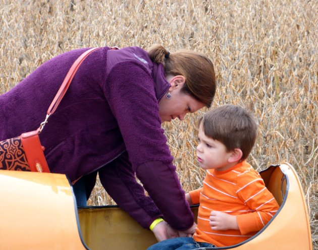 Mommy straps Nick in
